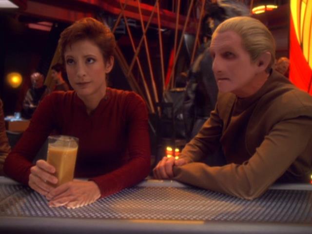 Kira and Odo share a drink at Quark's