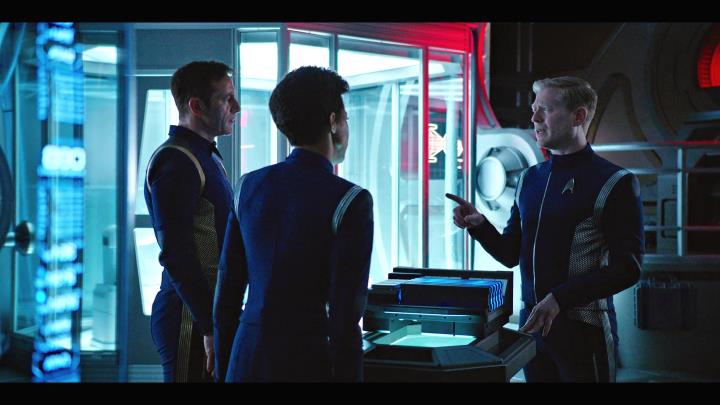 Lorca and Burnham confer with Lt. Stamets