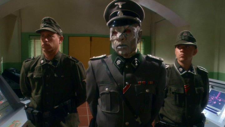 Na'kuhl officer Ghrath works with the Nazis
