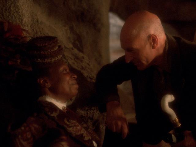 Picard stays with Guinan in the caverns