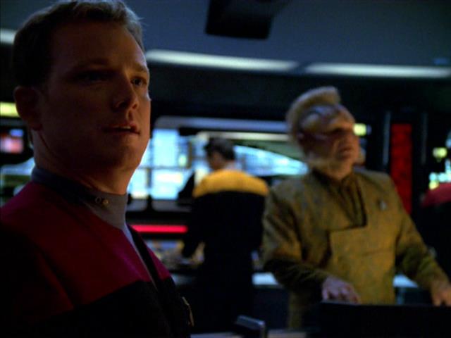 Tom Paris and Neelix on the bridge of U.S.S. Voyager